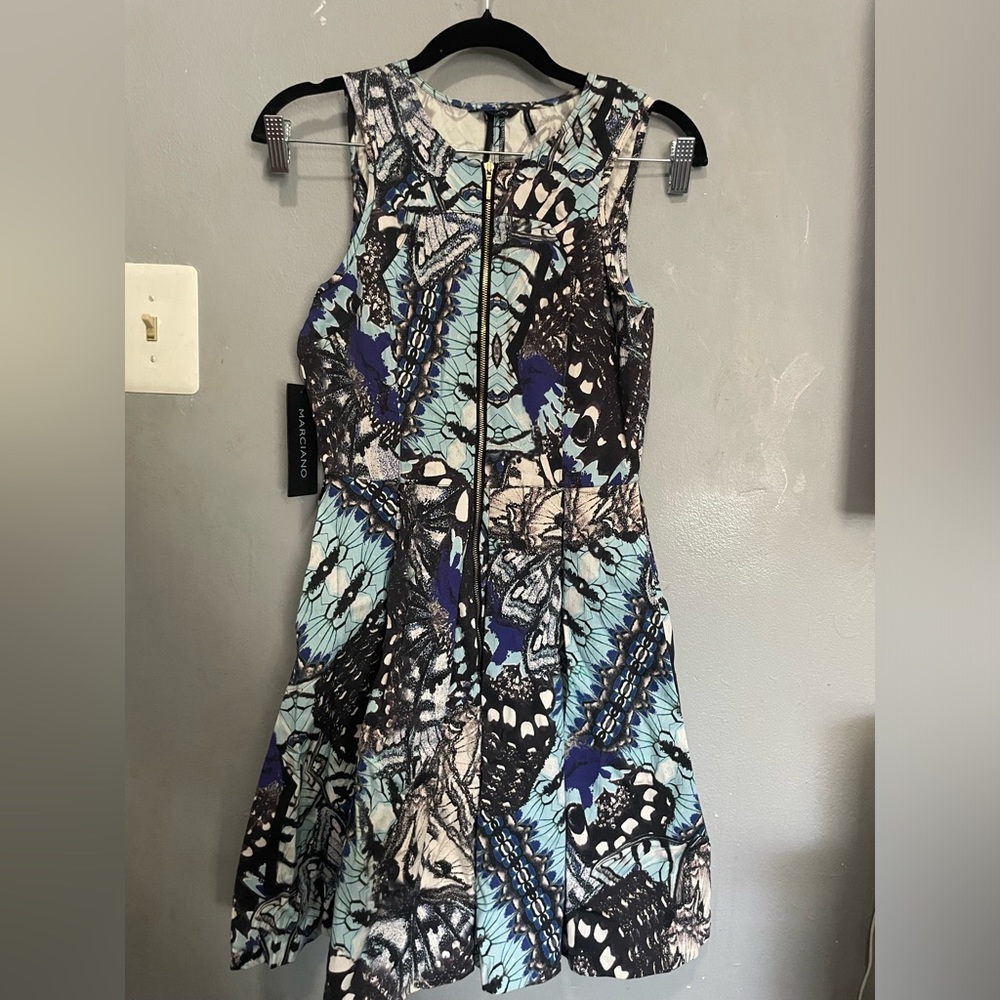 Marciano, pleated a-line, size 6 with pockets